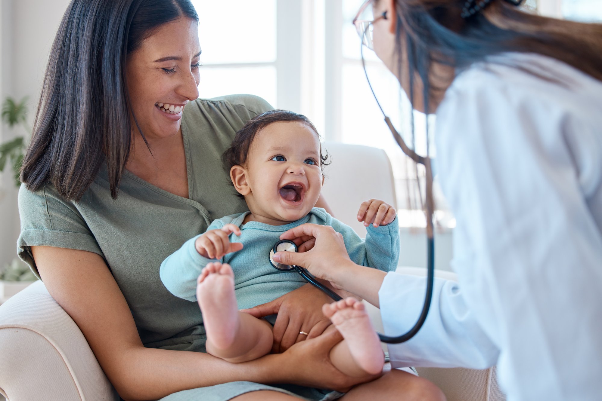 Doctor happy infant kid and chest assessment in clinic, hospital and medical analysis