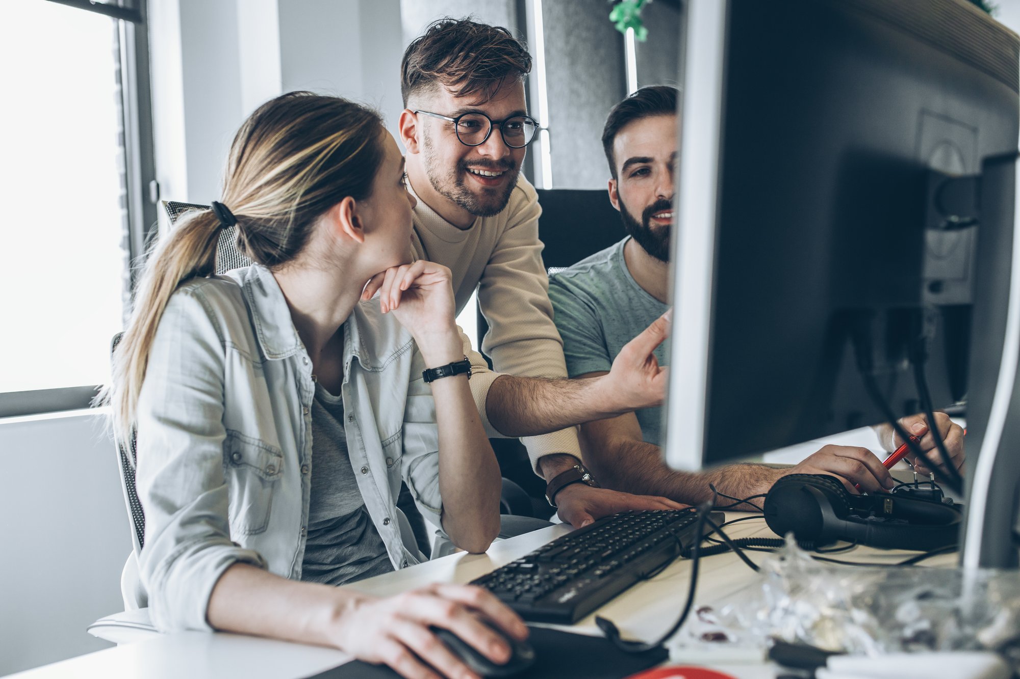 Group of programmers and software developers working on a new project at the office