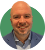 Headshot of Andre Proulx on a green background