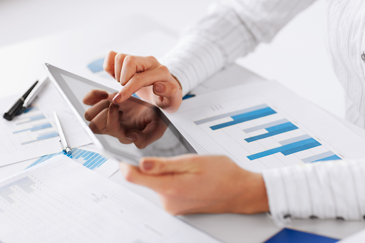 An employee creating a cashflow forecast