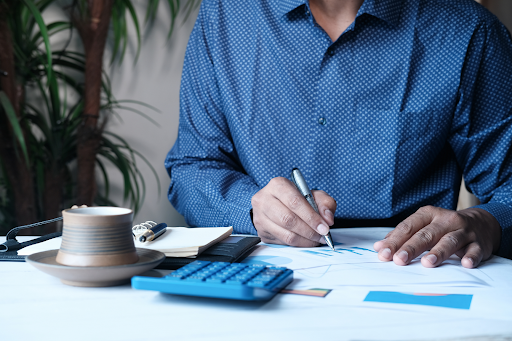 A person looking at financial projections