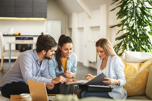 A couple meeting with an insurance broker