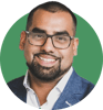 Headshot of Shaun Jansen on a green background