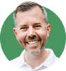 Headshot of Tom Seegmiller on a green background,